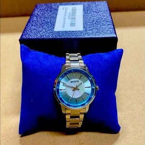 NWT Skone Women’s Silver and Blue Minimalistic Watch